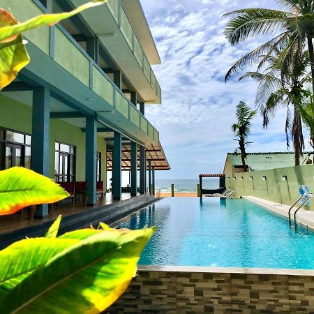 Serenade Beach Hotel Хиккадува Экстерьер фото